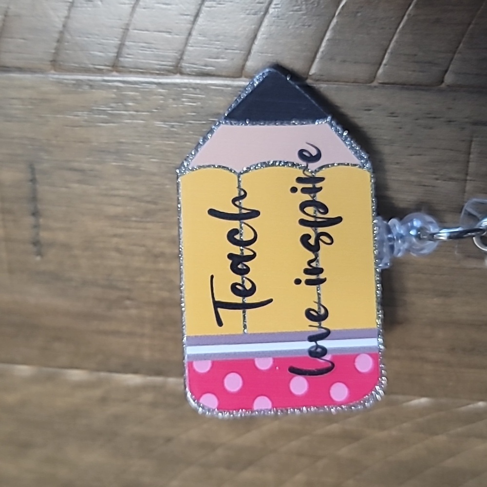 Teach Love Inspire badge reel